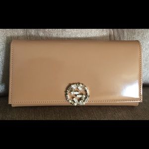 GG sparkling polished leather continental wallet